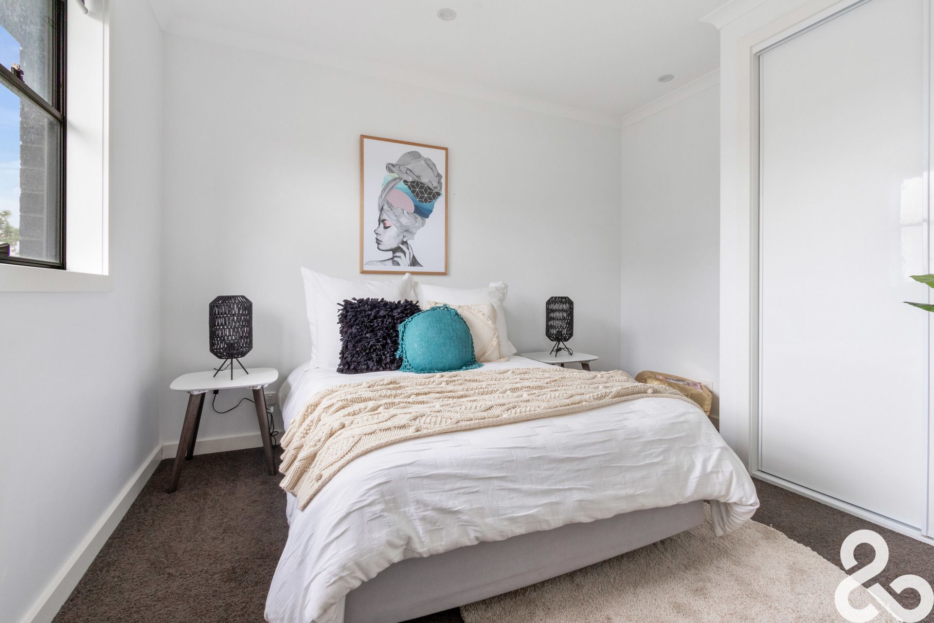 A MUST SEE! Designer Upper-Level Unit in Prime Location
