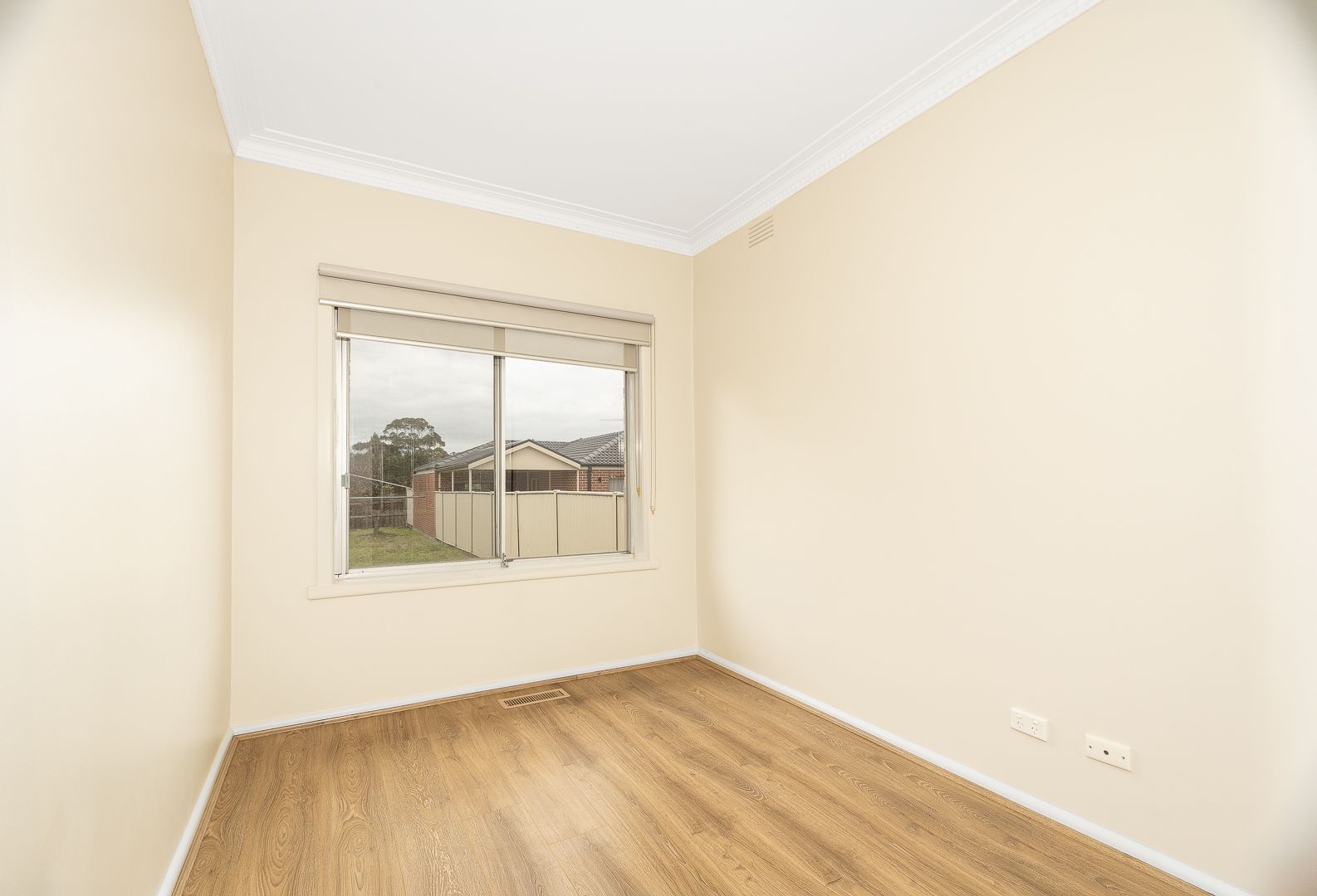 Well-Maintained Three-Bedroom Home with Large Backyard