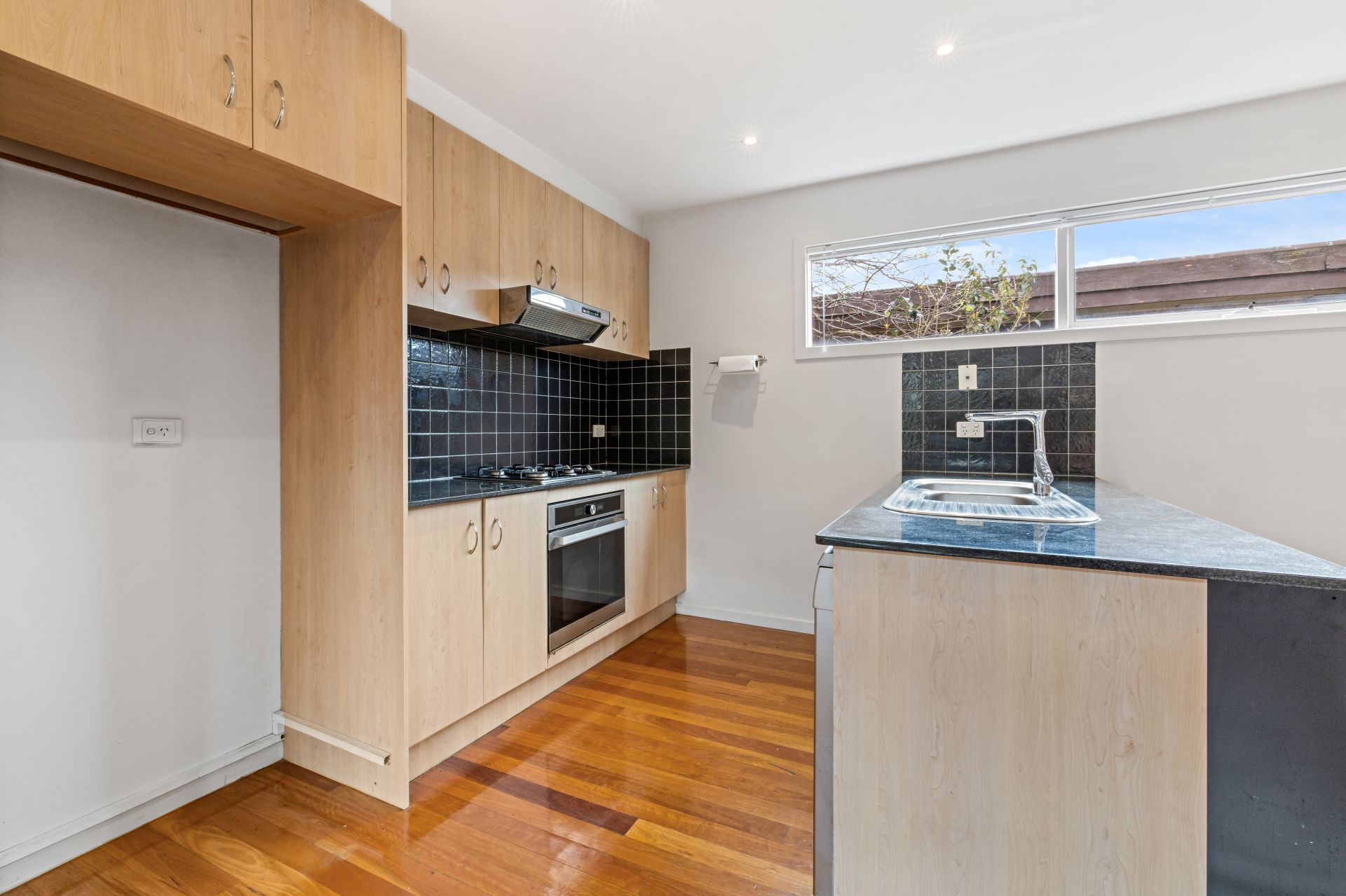 Stylish three bedroom townhouse is ideally located